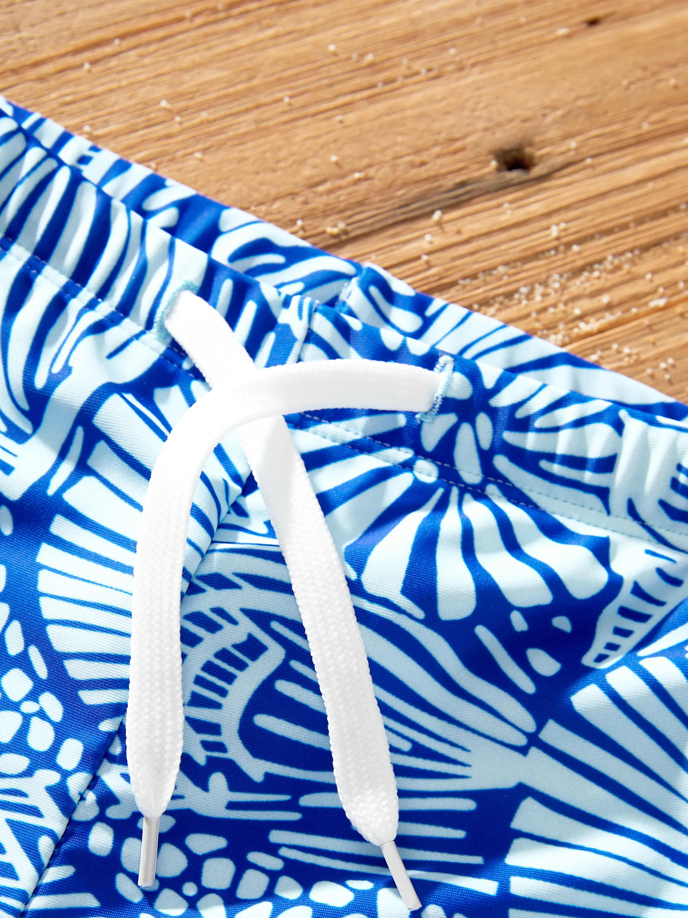 17635-toddler-boy-shell-print-swimwear-floral-swim-shorts-set-for-boys-perfect-for-beach-days-pool-parties-blue-4.webp Toddler Boy Shell Print Swimwear Floral Swim Shorts Set for boys, Perfect for Beach Days & Pool Parties Blue