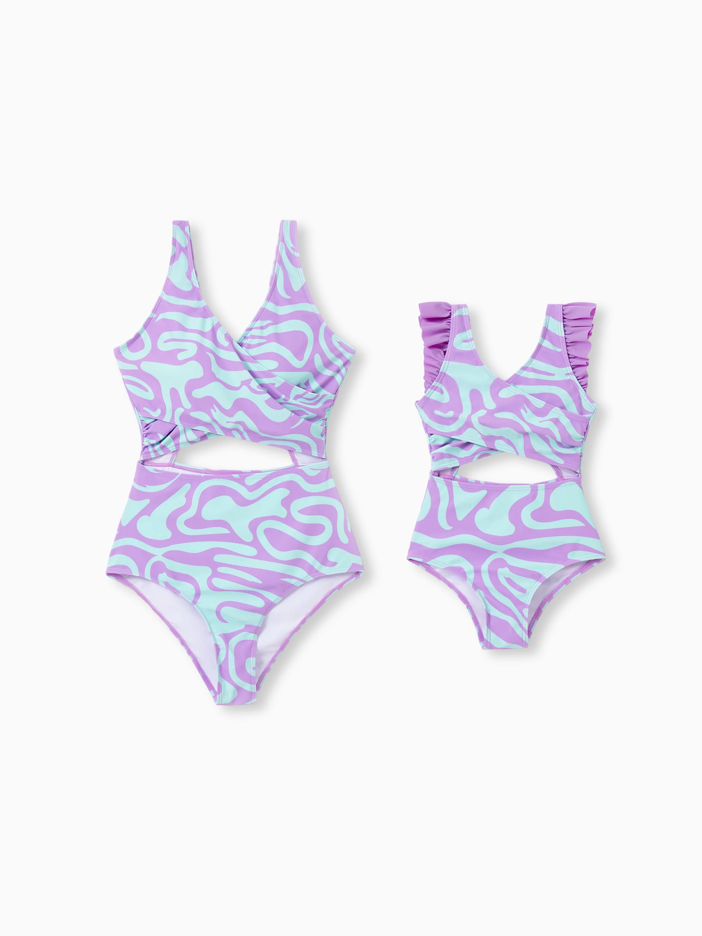 25856-mommy-me-trendy-purple-blue-wave-print-midriff-cutout-one-piece-swimsuit-purple-1.webp Mommy & me Trendy Purple & Blue Wave Print Midriff Cutout One-Piece Swimsuit Purple