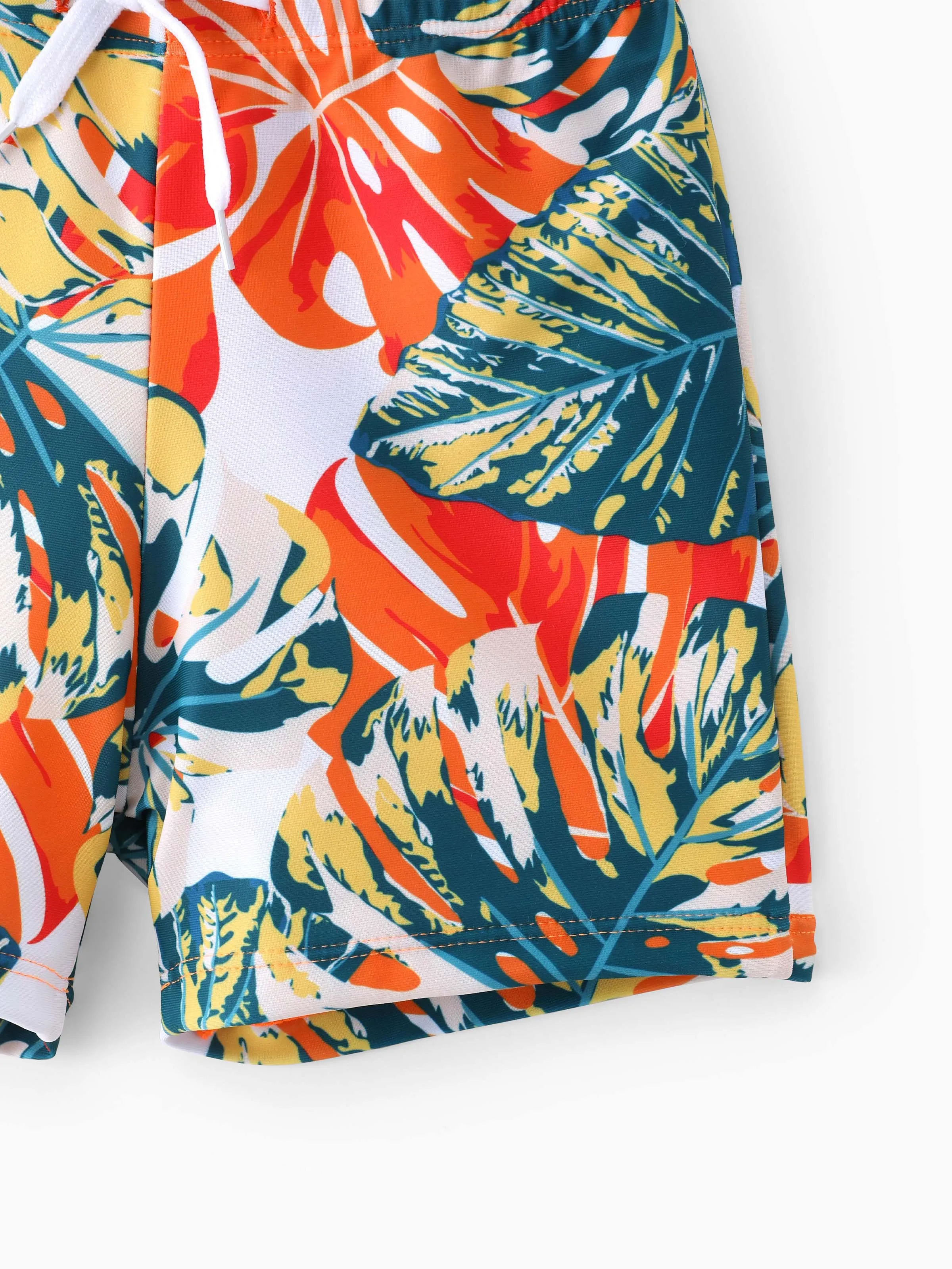 26420-toddler-boy-orange-and-all-over-tropical-plant-print-splicing-ruffle-swim-trunks-shorts-orange-color-4.webp Toddler Boy Orange and All Over Tropical Plant Print Splicing Ruffle Swim Trunks Shorts Orange color