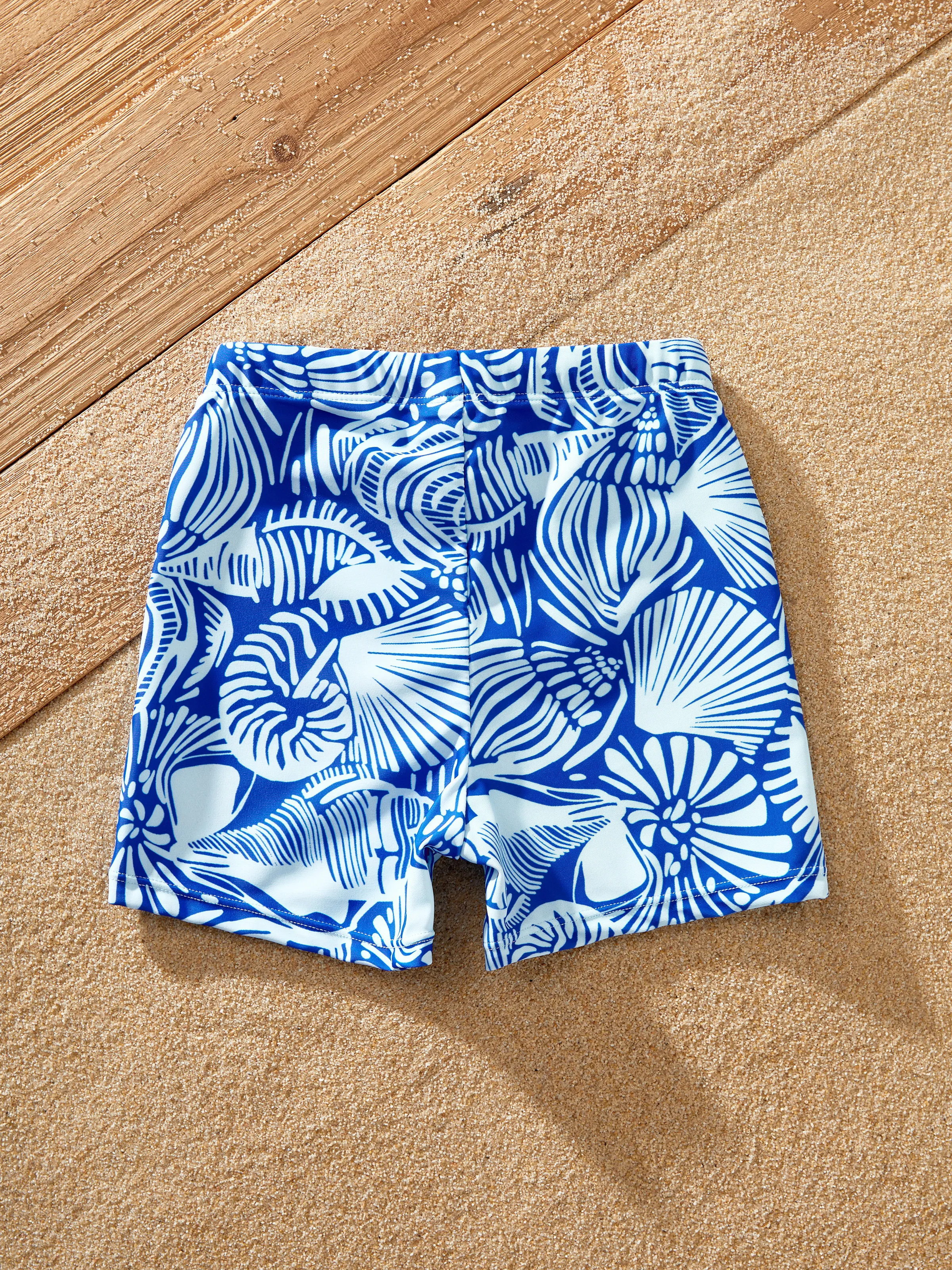 28764-toddler-boy-shell-print-swimwear-floral-swim-shorts-set-for-boys-perfect-for-beach-days-pool-parties-blue-3.webp Toddler Boy Shell Print Swimwear Floral Swim Shorts Set for boys, Perfect for Beach Days & Pool Parties Blue