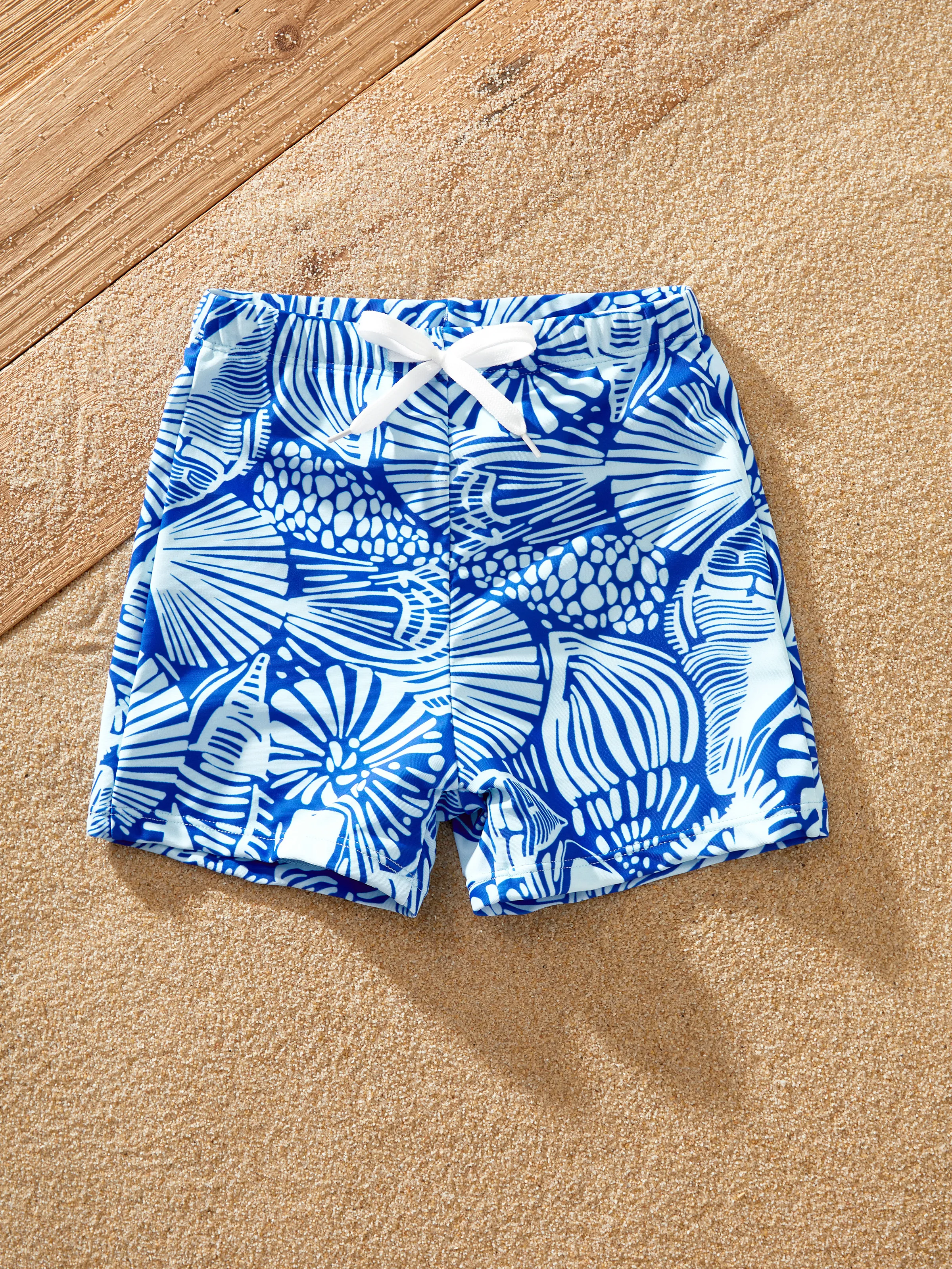 29937-toddler-boy-shell-print-swimwear-floral-swim-shorts-set-for-boys-perfect-for-beach-days-pool-parties-blue-1.webp Toddler Boy Shell Print Swimwear Floral Swim Shorts Set for boys, Perfect for Beach Days & Pool Parties Blue